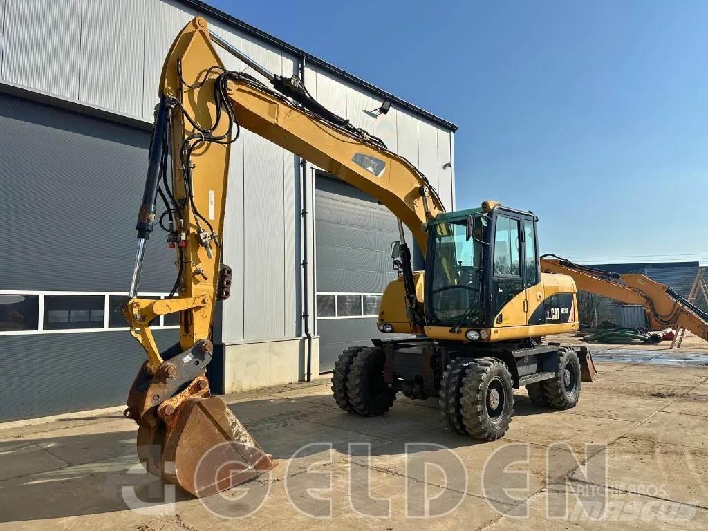 CAT M313D Hjulgravere
