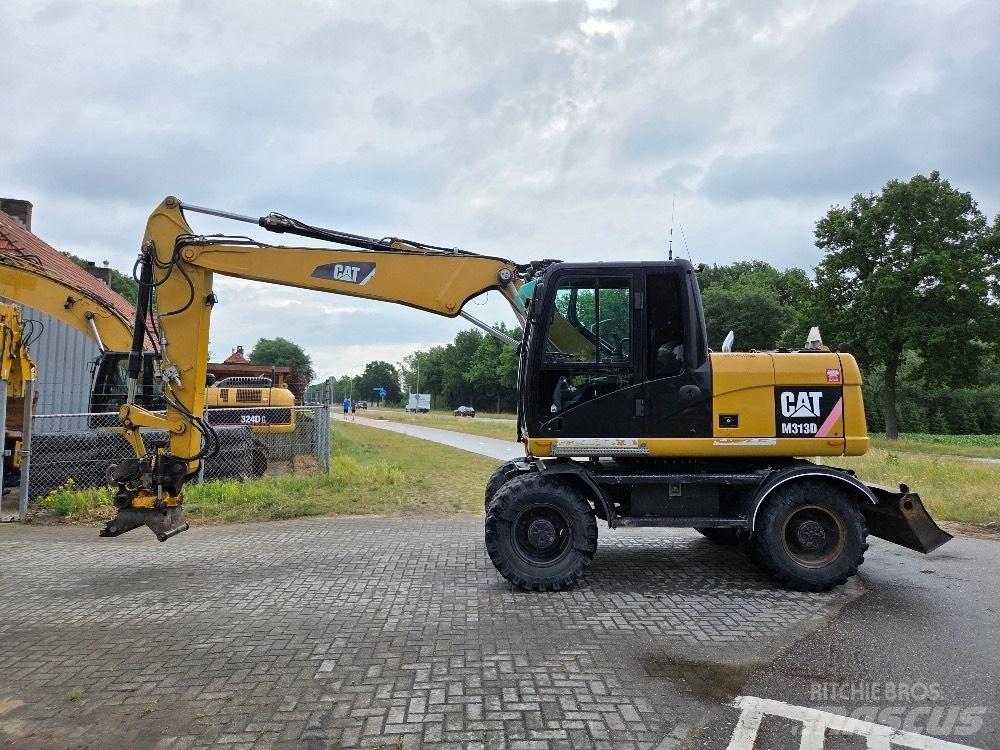 CAT M313D Hjulgravere