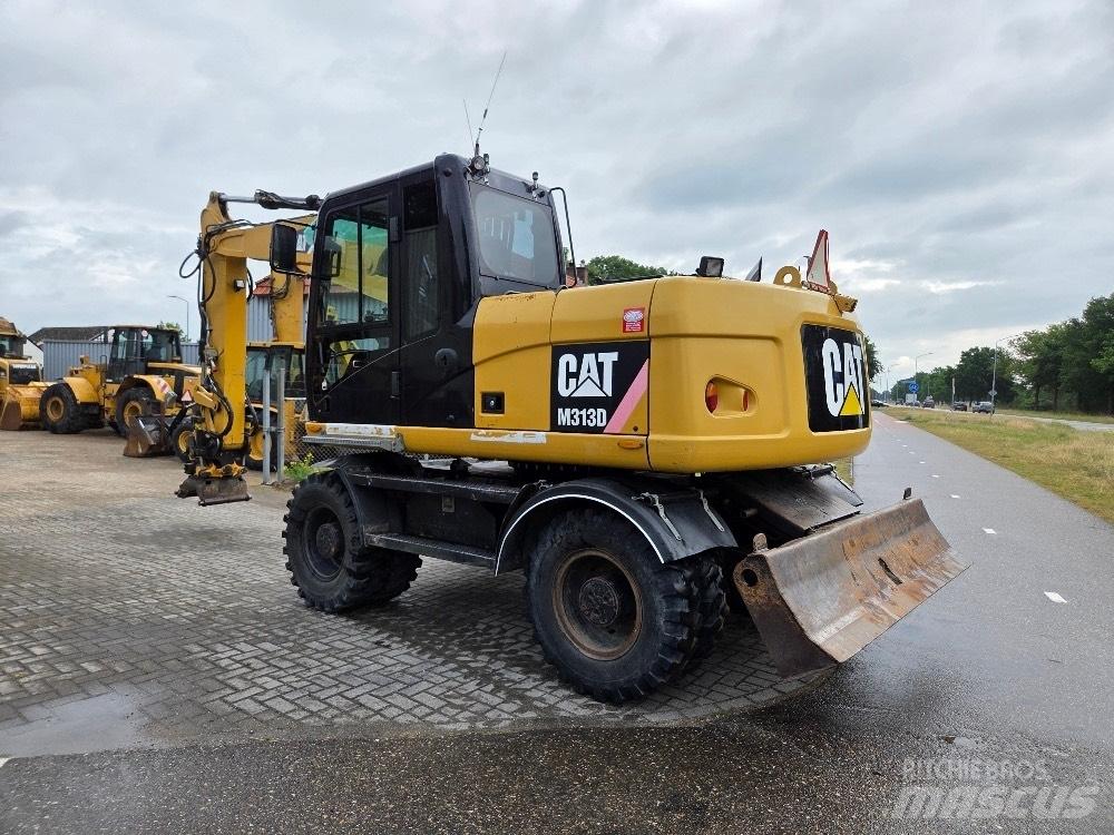 CAT M313D Hjulgravere