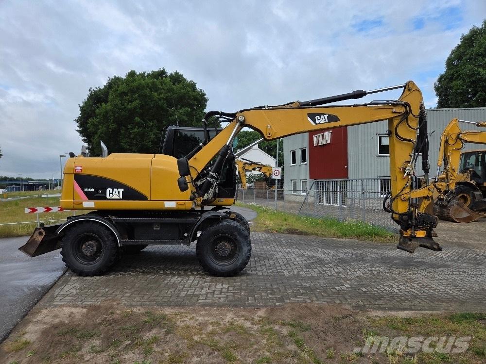 CAT M313D Hjulgravere
