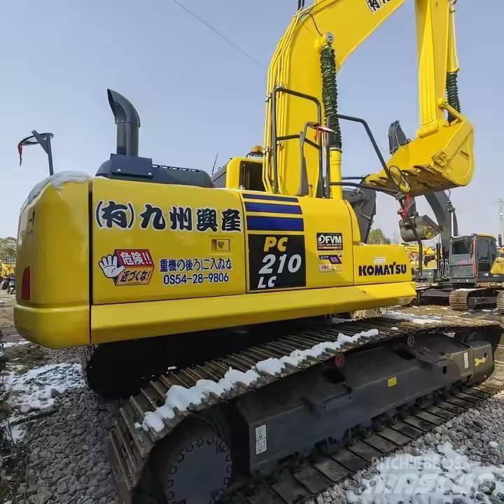 Komatsu PC 210 Beltegraver