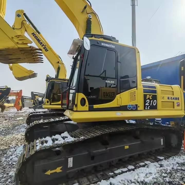Komatsu PC 210 Beltegraver