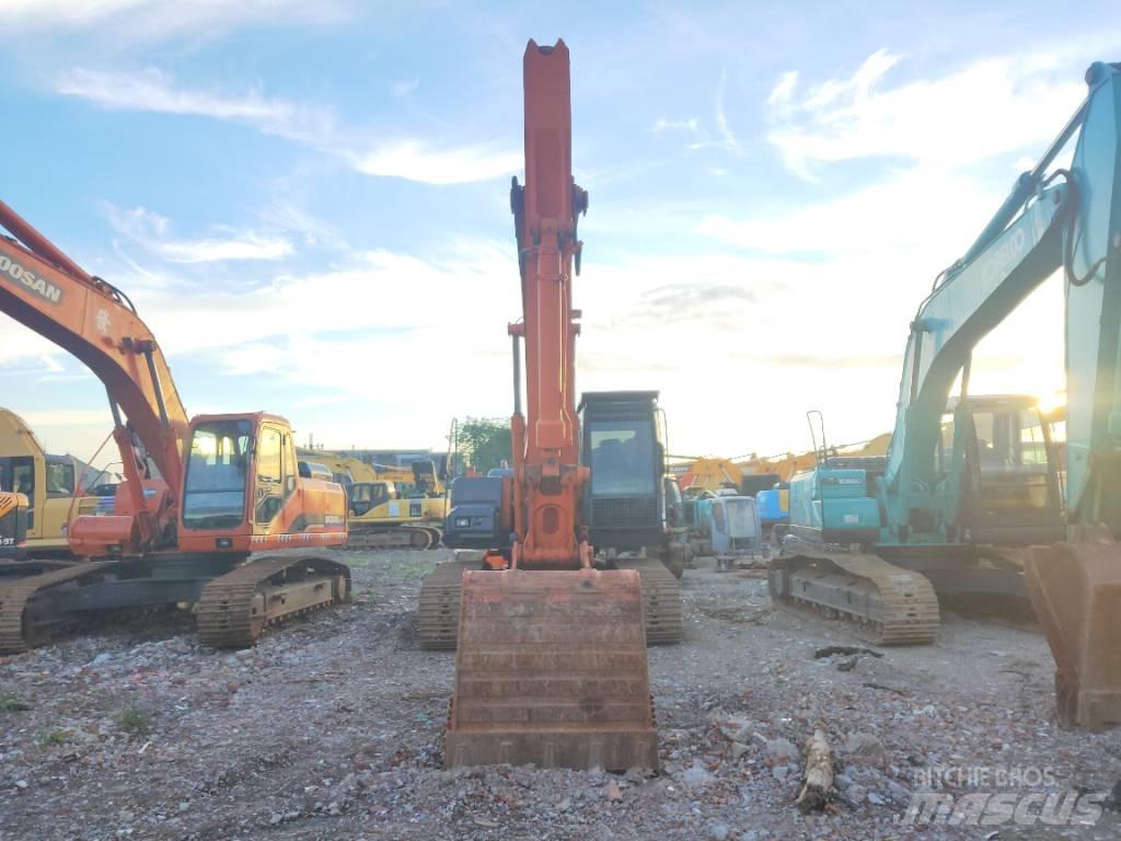 Hitachi ZX 210 Beltegraver