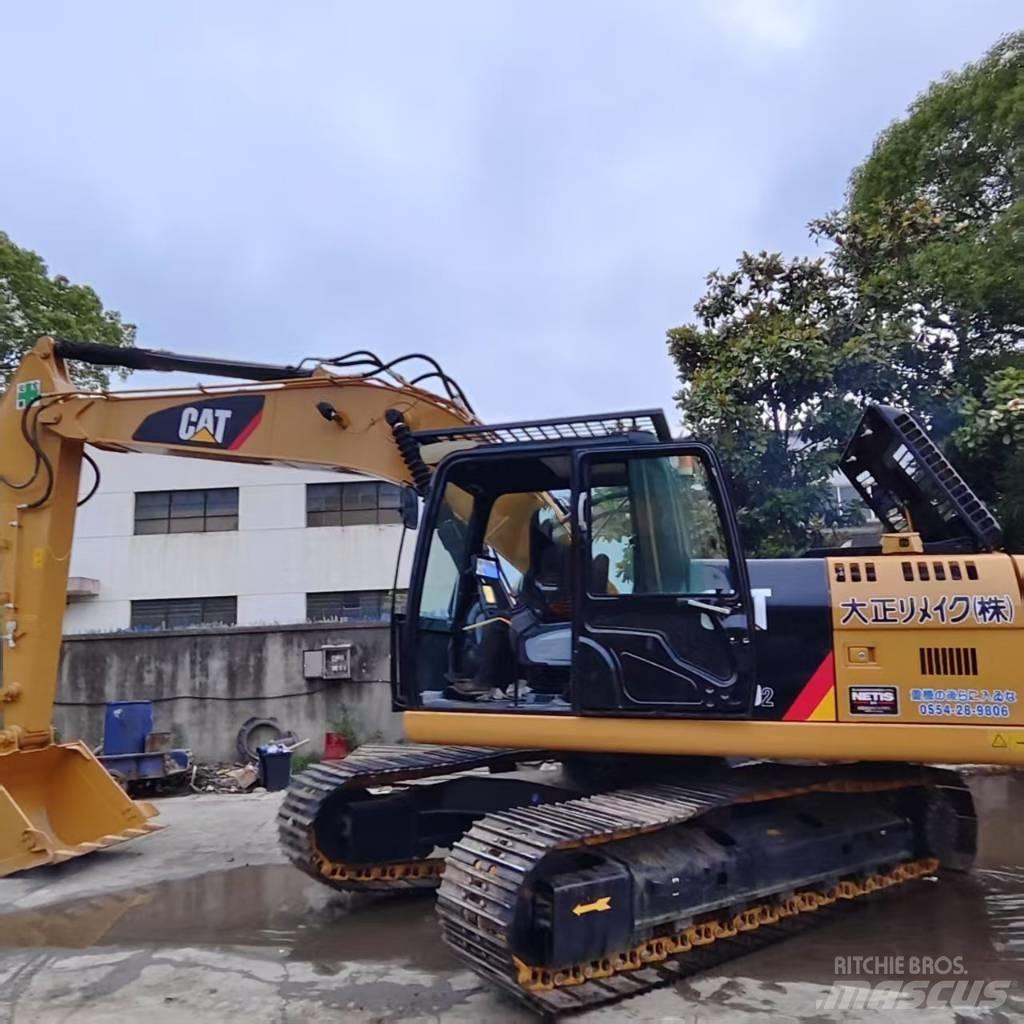 CAT 320 Beltegraver