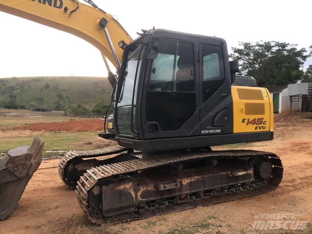 New Holland E 145 Beltegraver