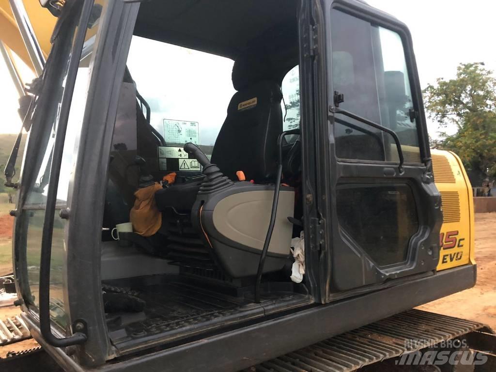 New Holland E 145 Beltegraver