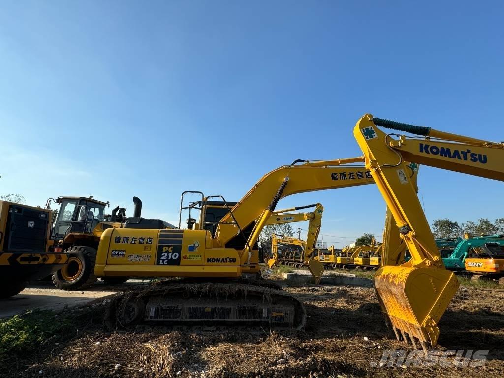 Komatsu PC 210 Beltegraver