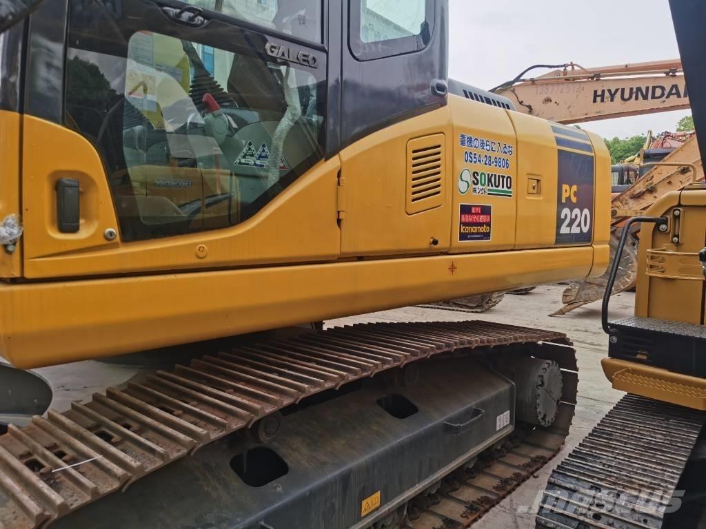 Komatsu PC220-7 Beltegraver