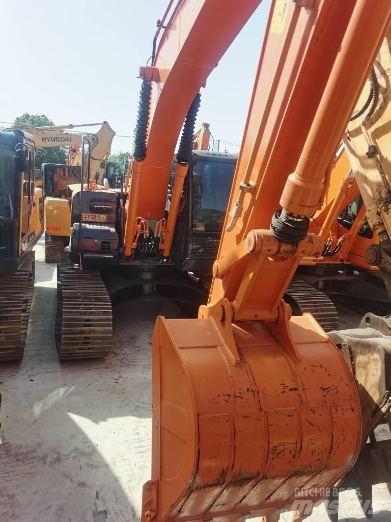 Hitachi ZX 210 Beltegraver