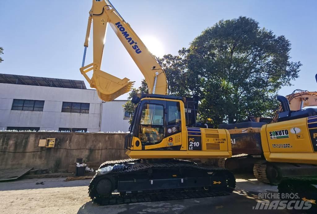 Komatsu PC210LC Beltegraver