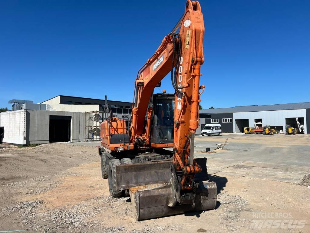 Doosan DX 140 W Hjulgravere