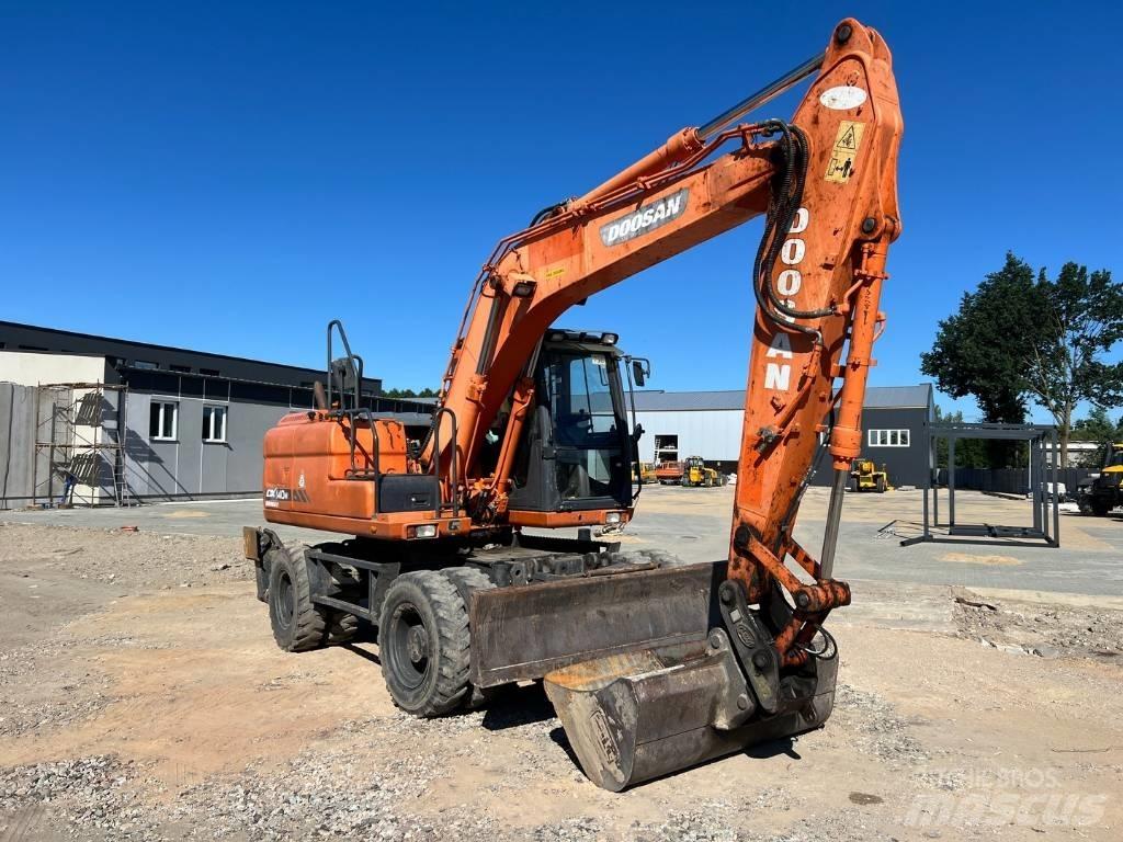 Doosan DX 140 W Hjulgravere