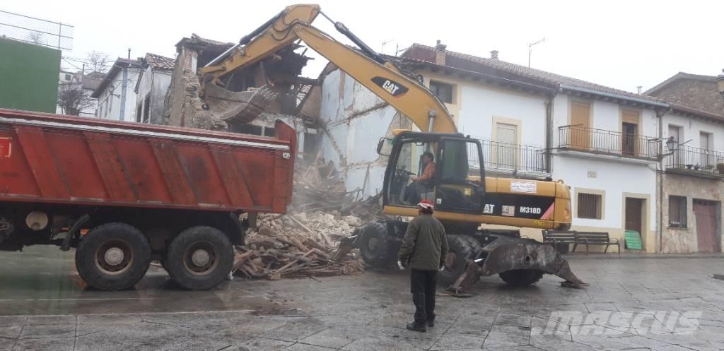 CAT M318d Hjulgravere