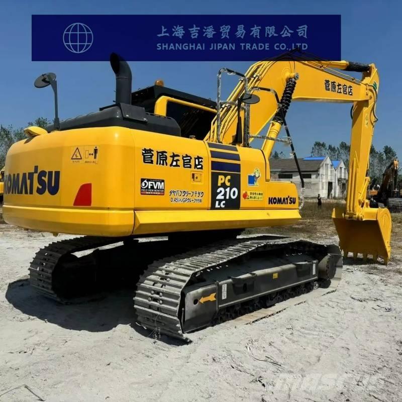 Komatsu PC 210 Beltegraver