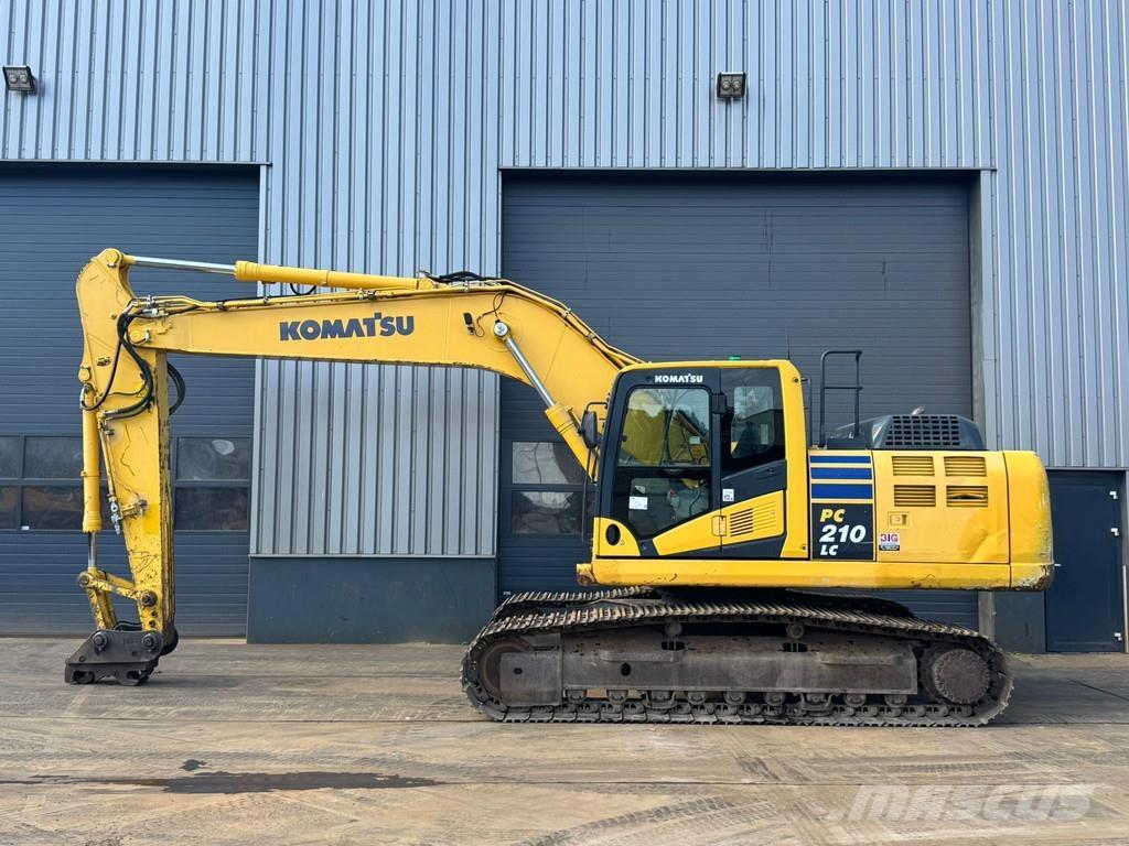 Komatsu PC210LC-10 Beltegraver