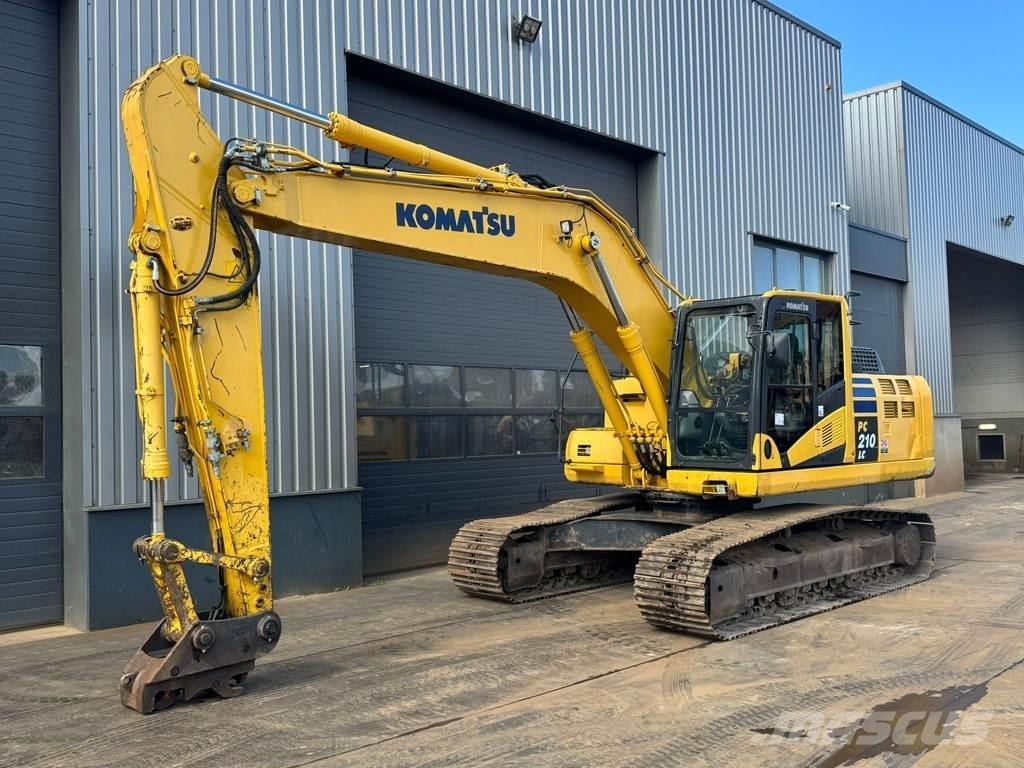 Komatsu PC210LC-10 Beltegraver
