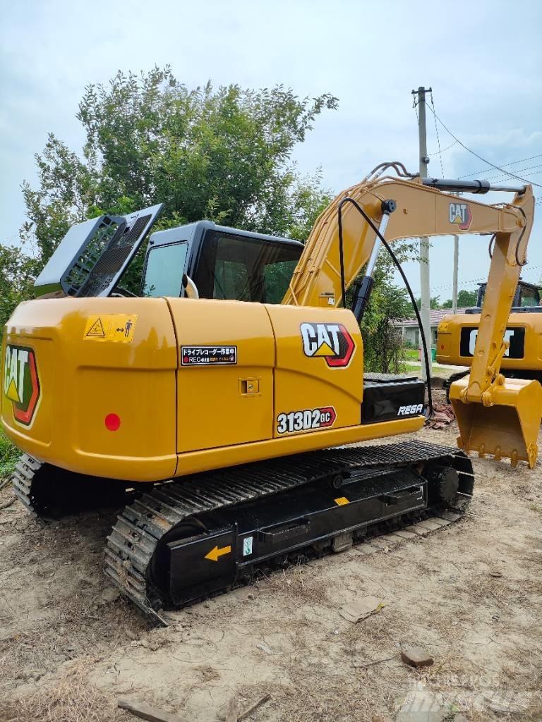 CAT 313D2GC Midigravere 7 - 12t