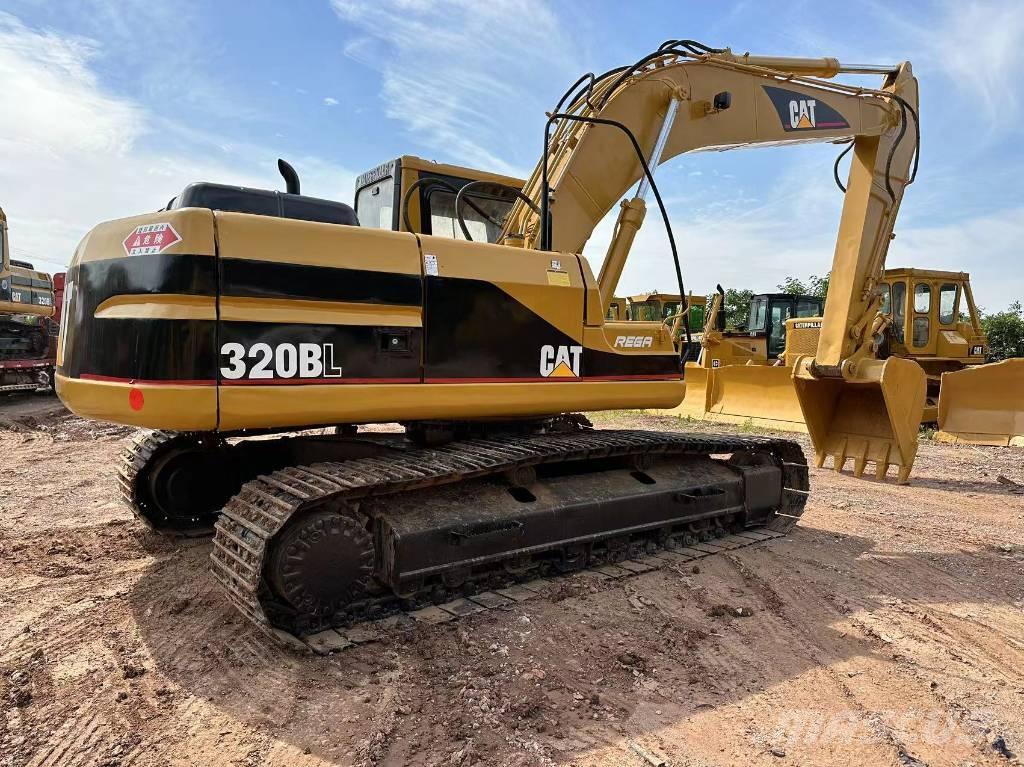 CAT 320B Beltegraver