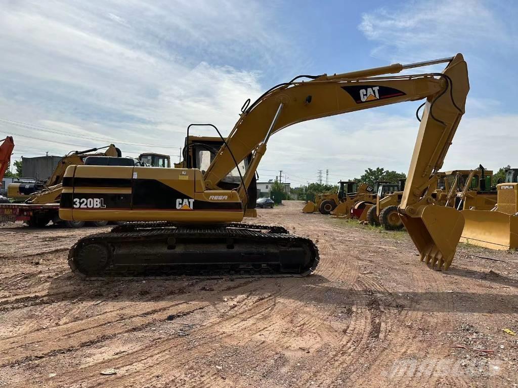 CAT 320B Beltegraver