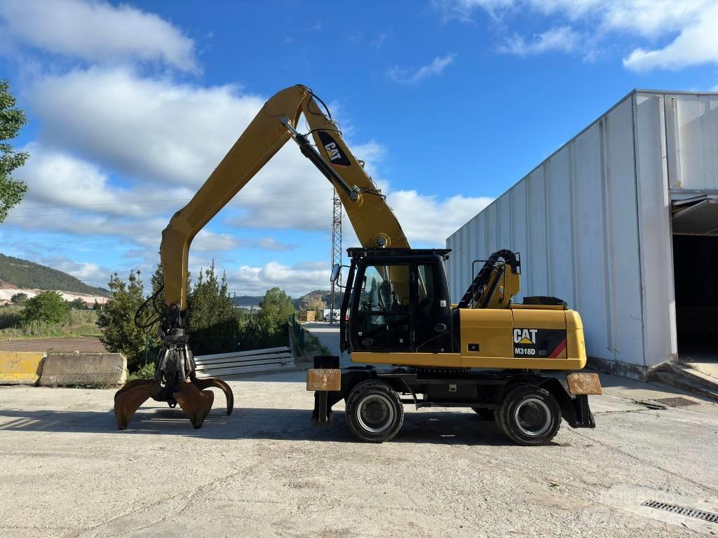 CAT M 318 MH Hjulgravere
