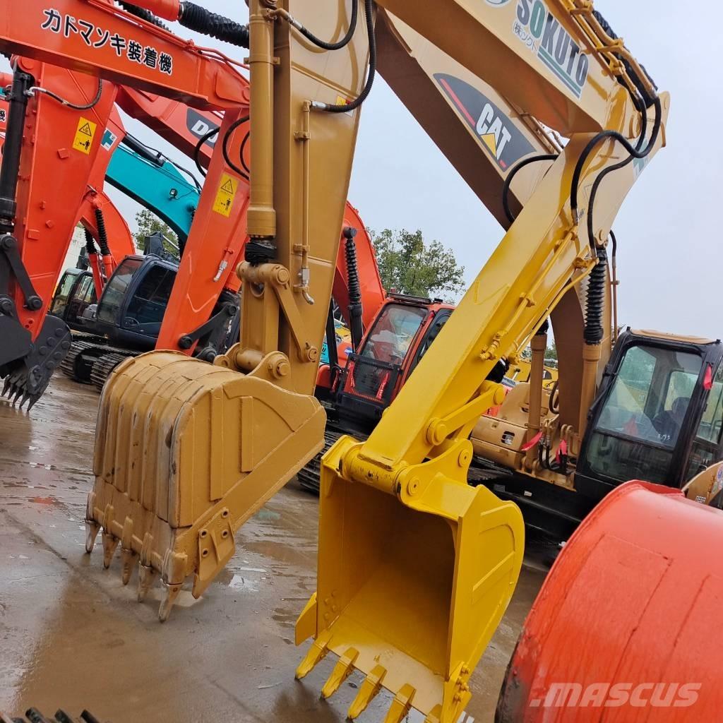 Komatsu PC 130-7 Beltegraver