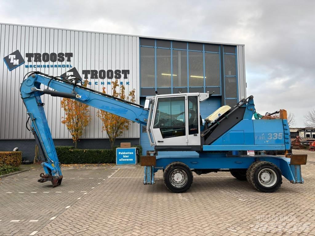 Fuchs MHL 335 Gravemaskiner for avfallshåndtering