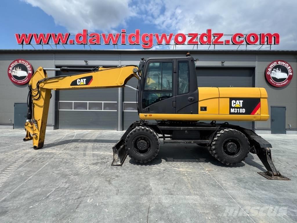 CAT M 318 D Hjulgravere