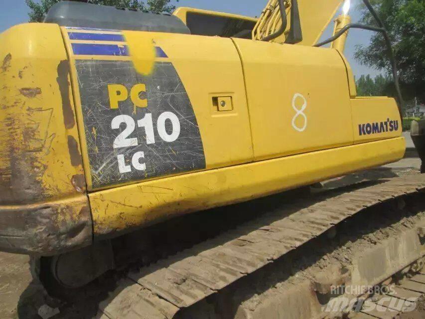 Komatsu PC 210-7 Beltegraver