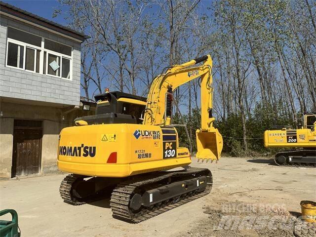 Komatsu PC130-7 Beltegraver