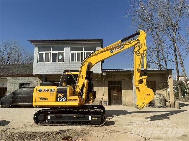 Komatsu PC130-7 Beltegraver
