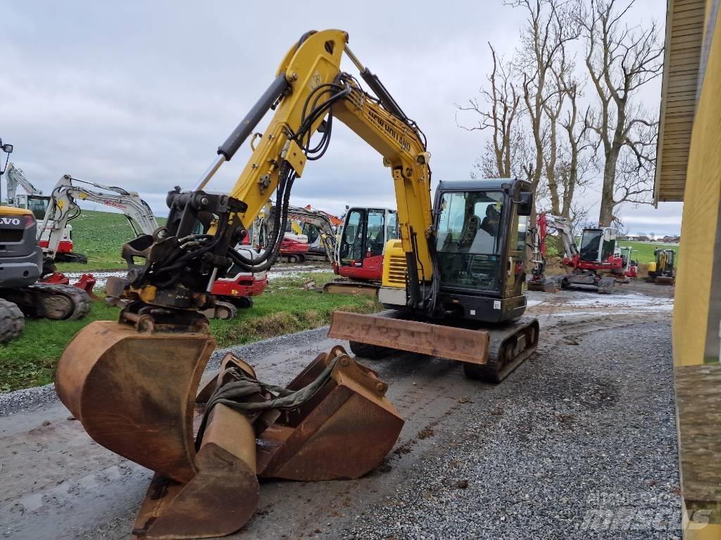 New Holland E60C Minigravere <7t