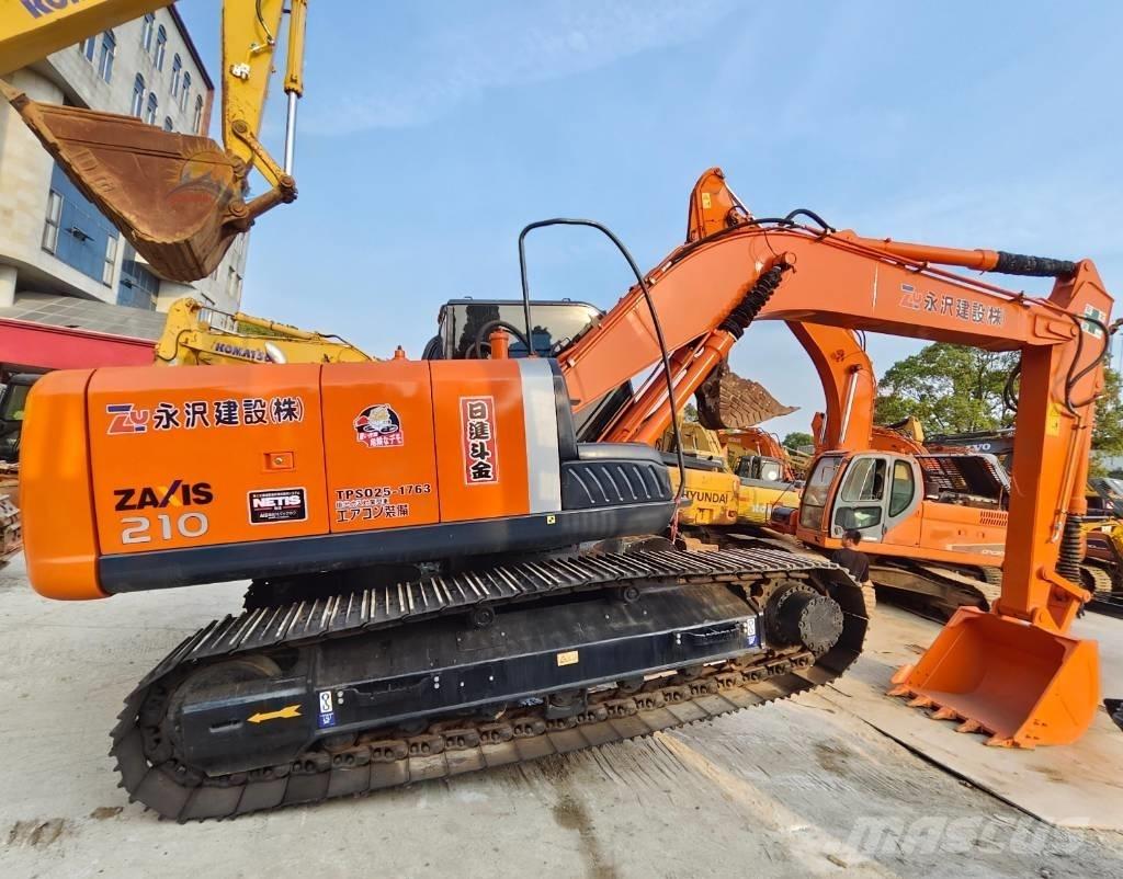 Hitachi ZX 210 Beltegraver