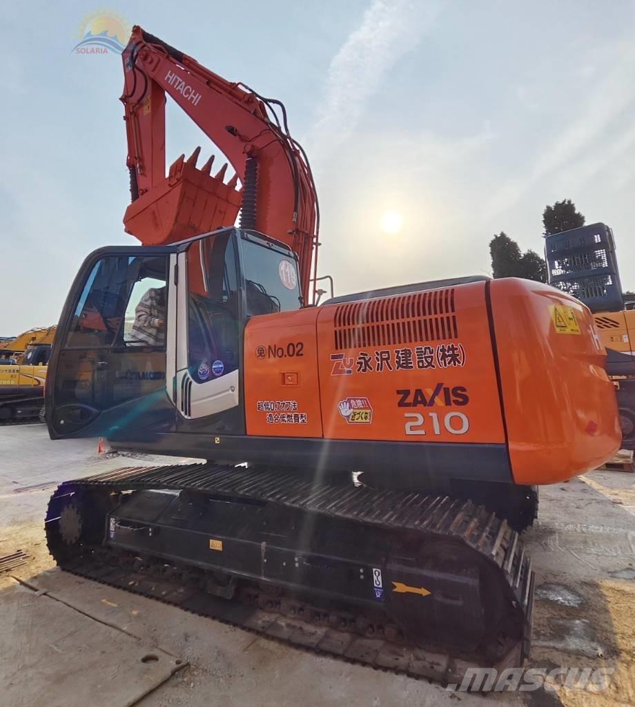 Hitachi ZX 210 Beltegraver