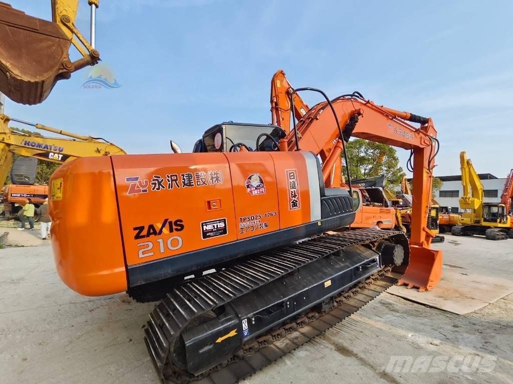 Hitachi ZX 210 Beltegraver