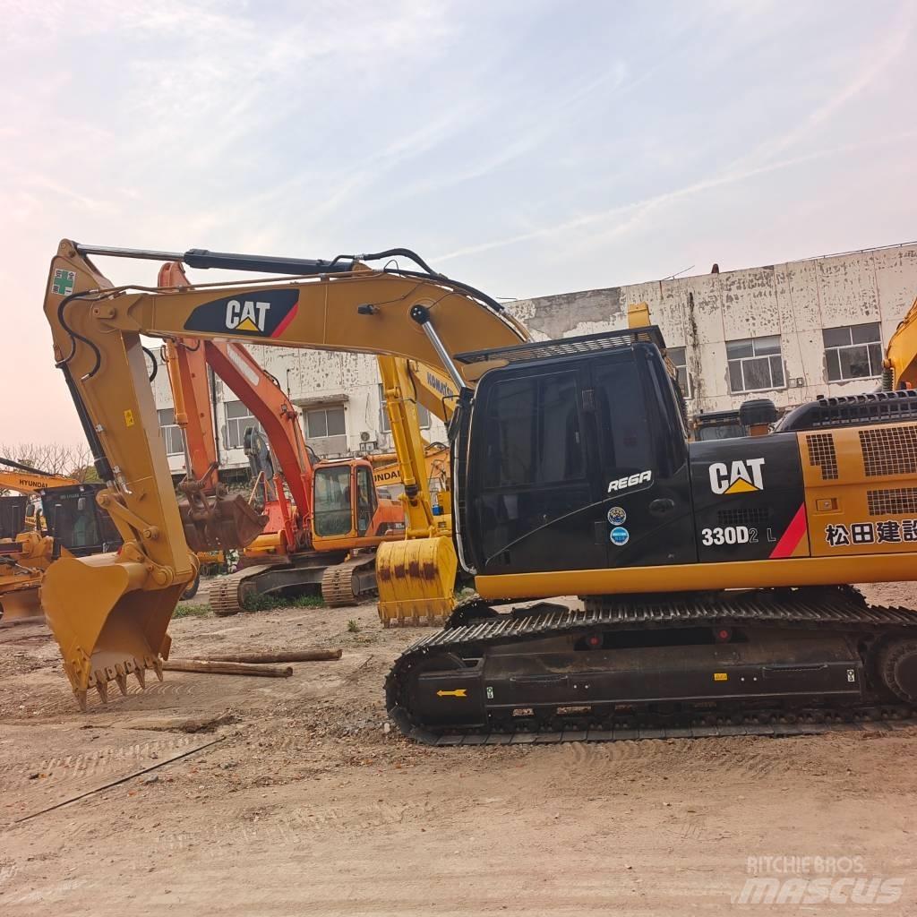 CAT 324D2L Beltegraver