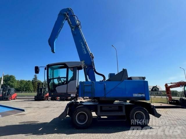 Fuchs MHL 334F Gravemaskiner for avfallshåndtering