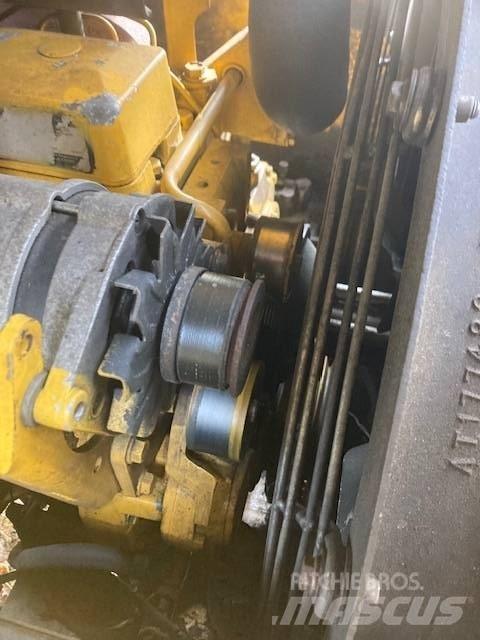 John Deere 200 LC Treknusere