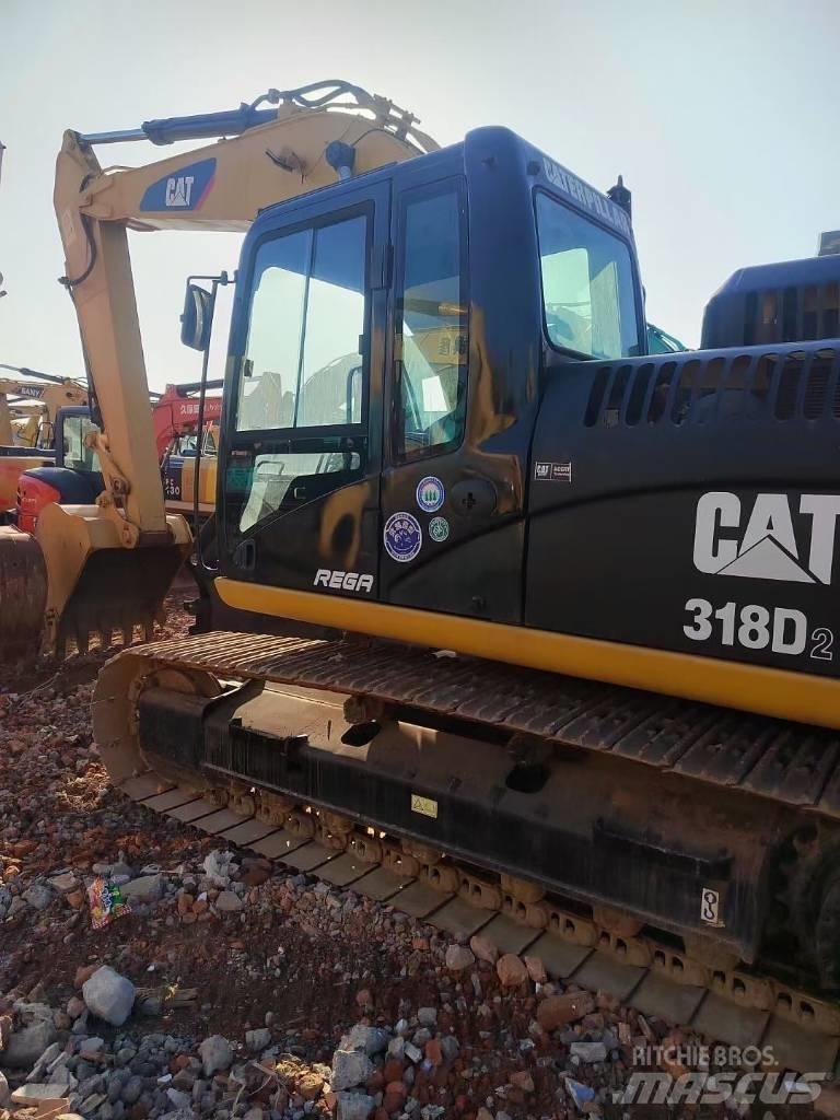 CAT 318 Beltegraver