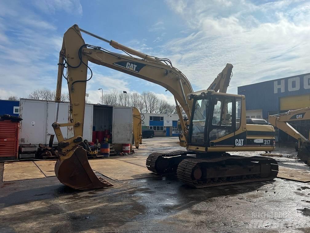 CAT 317 Beltegraver