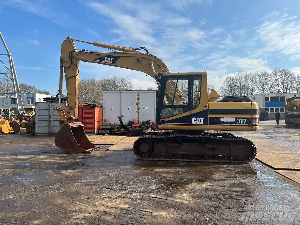 CAT 317 Beltegraver