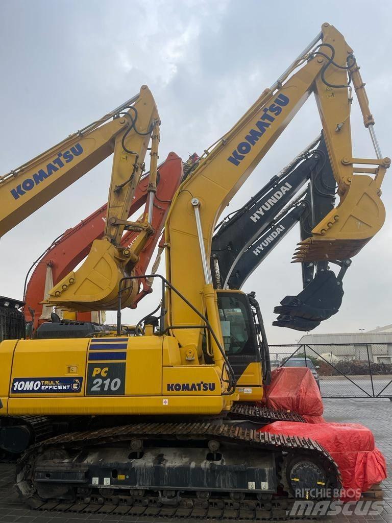 Komatsu PC210-10MO Beltegraver
