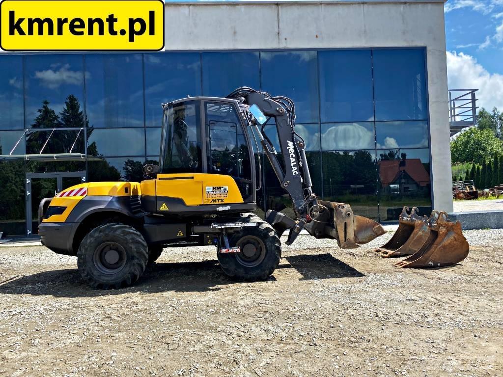 Mecalac 12 M TX Traktorgravere