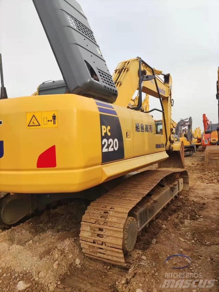 Komatsu PC220 Beltegraver