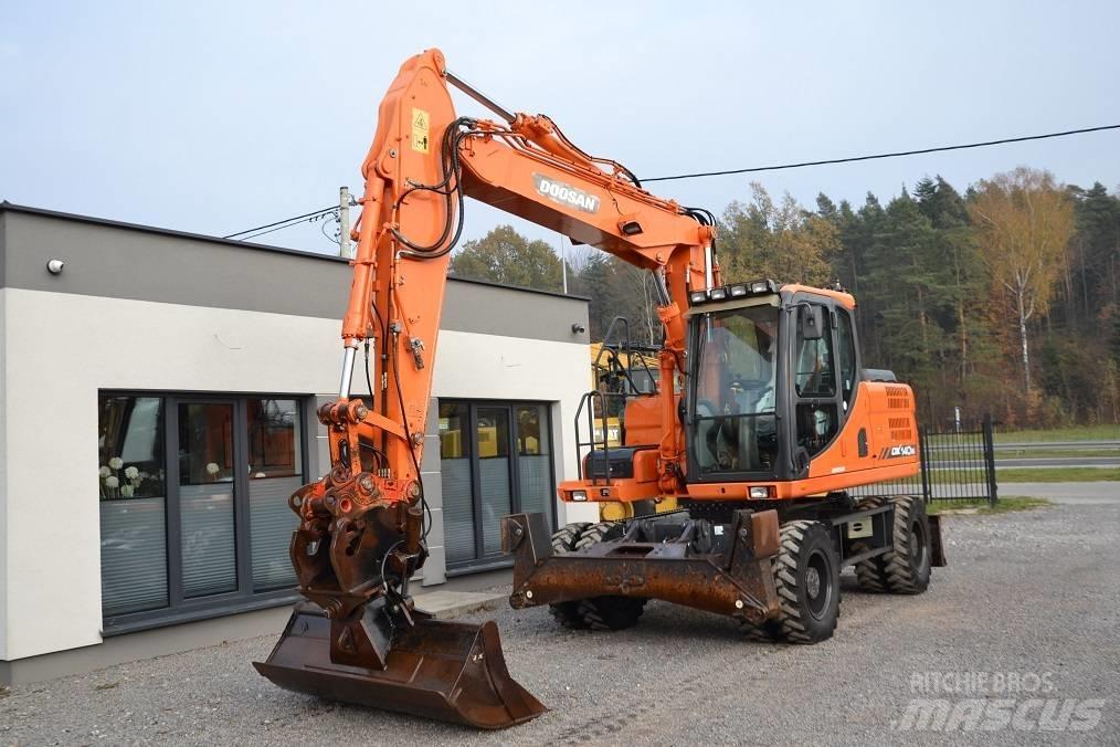 Doosan DX 140 W Hjulgravere