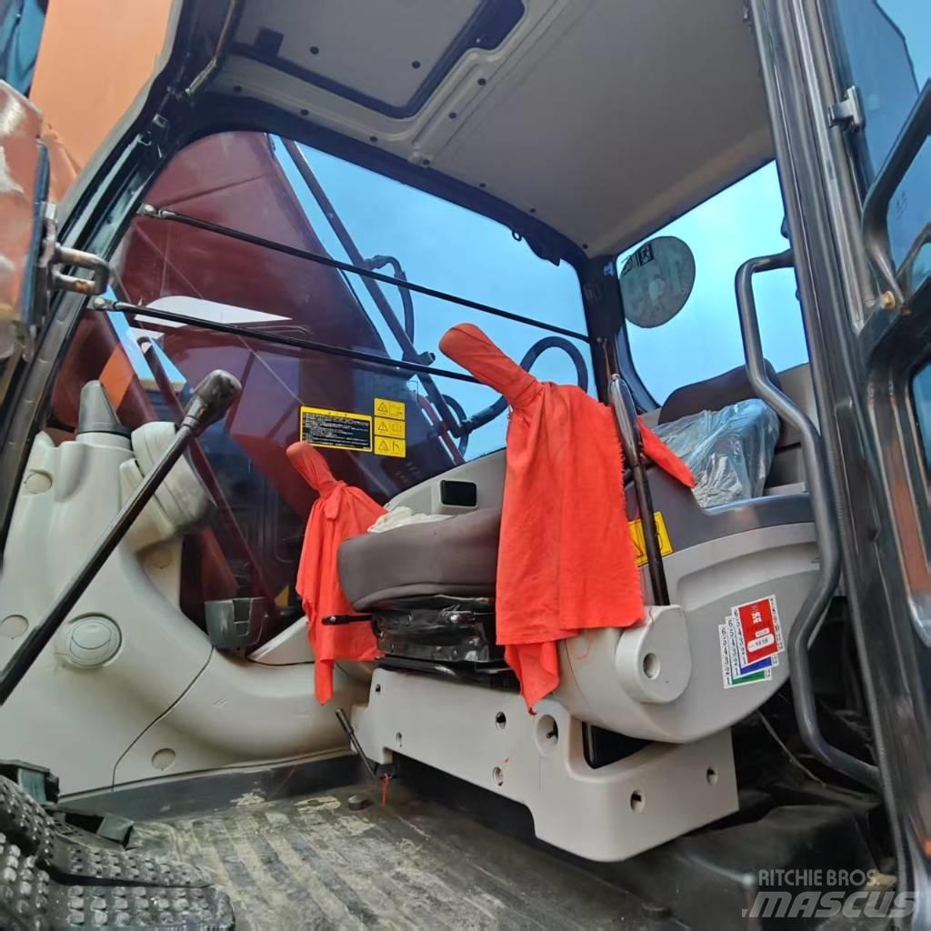 Hitachi ZX 210 Beltegraver