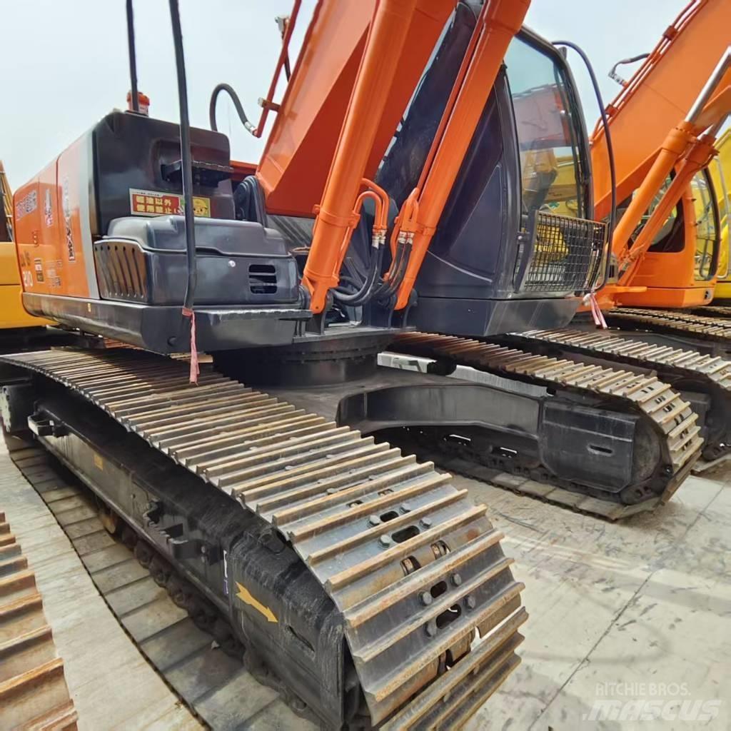 Hitachi ZX 210 Beltegraver