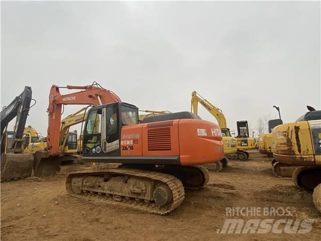 Hitachi ZX 210 Beltegraver