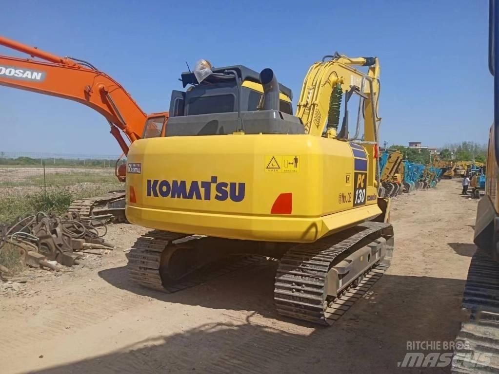 Komatsu PC130-7 Beltegraver