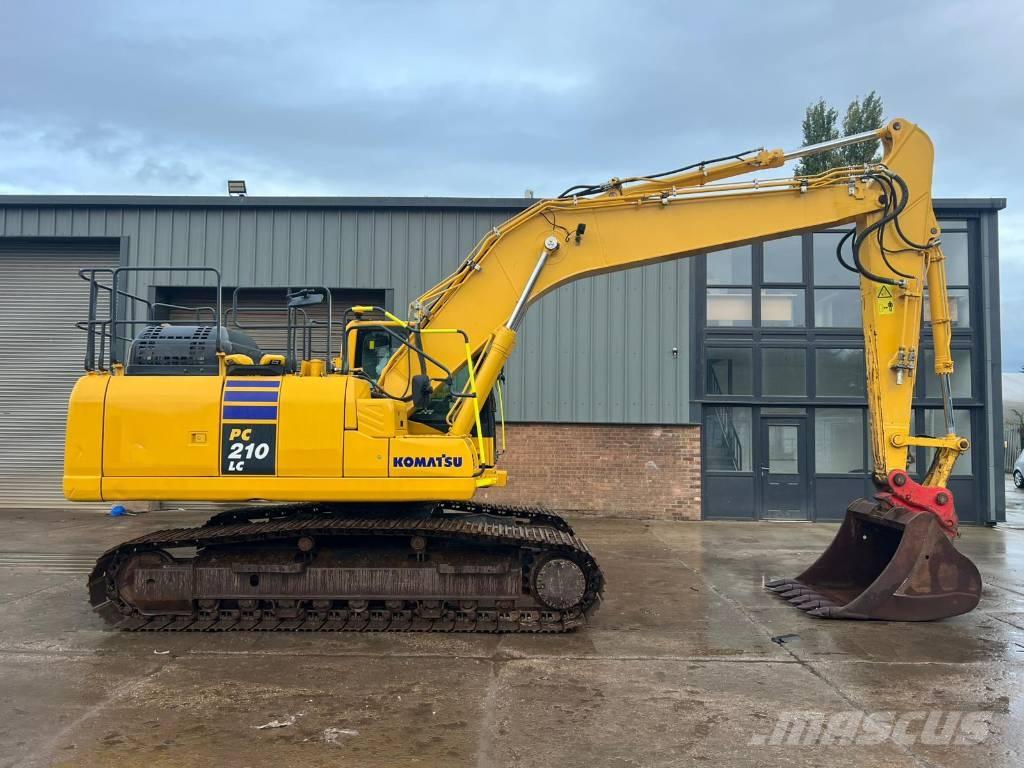 Komatsu PC 210-11 Beltegraver