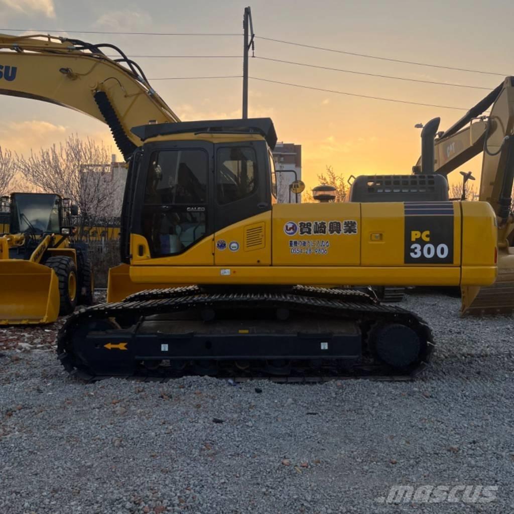Komatsu PC300 Beltegraver